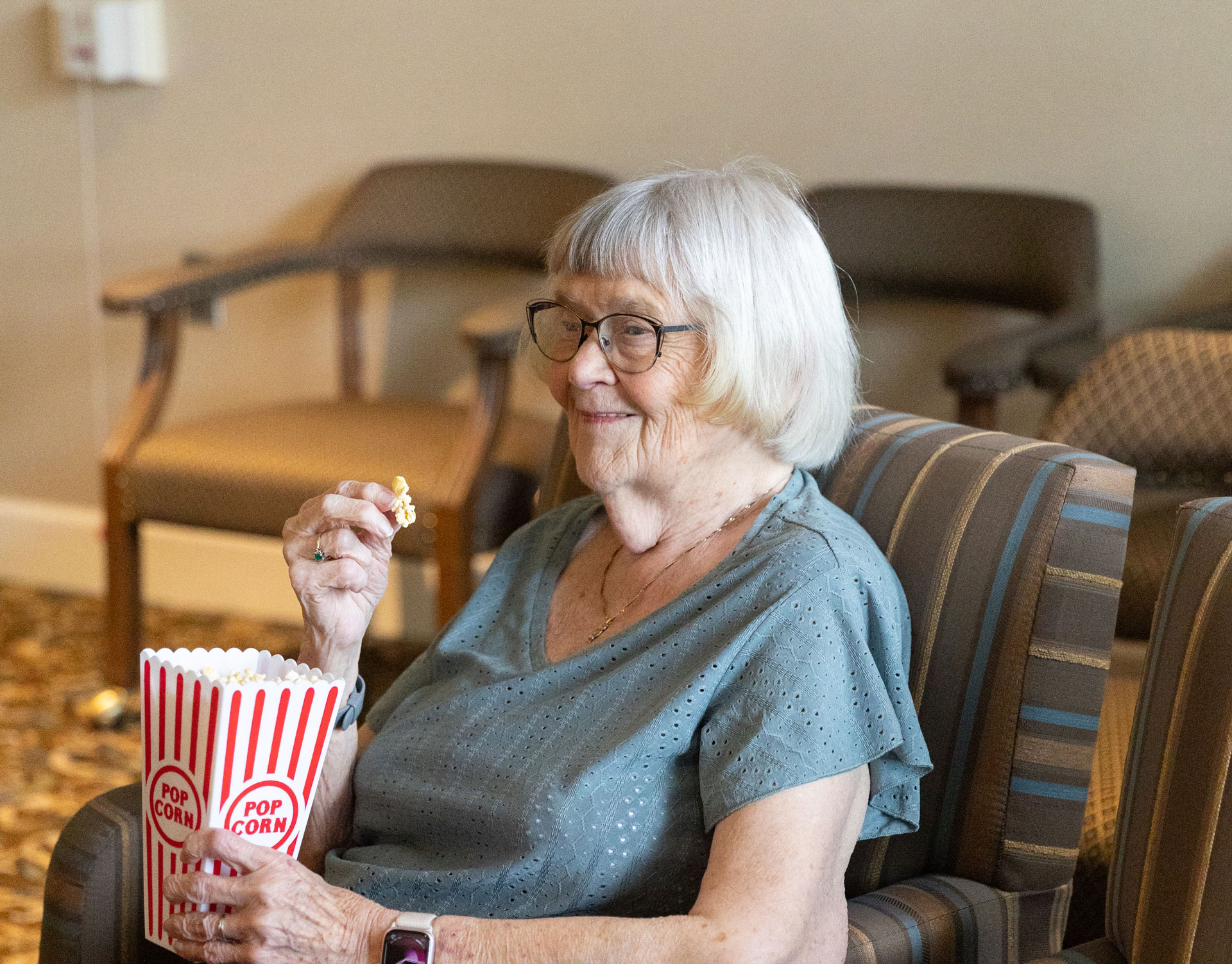 resident eating popcorn